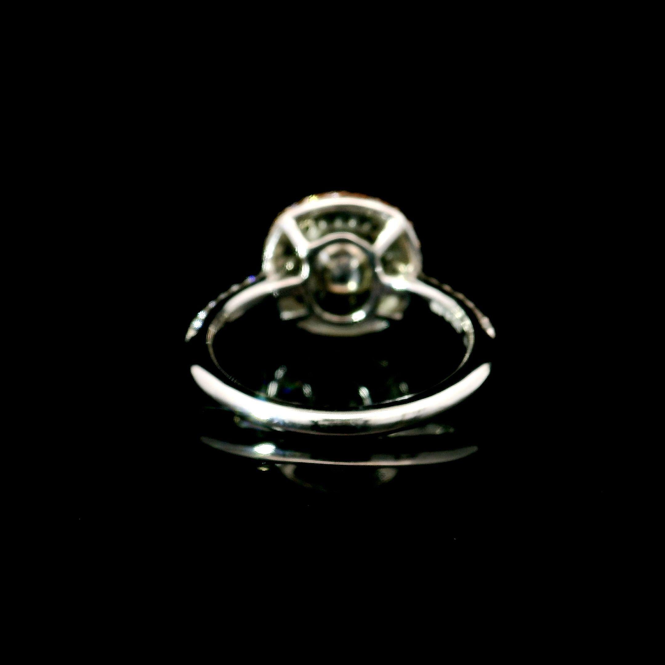 Women's or Men's GIA Certified 0.54 Carat Fancy Light Yellow Green VS2 Clarity Diamond Ring For Sale