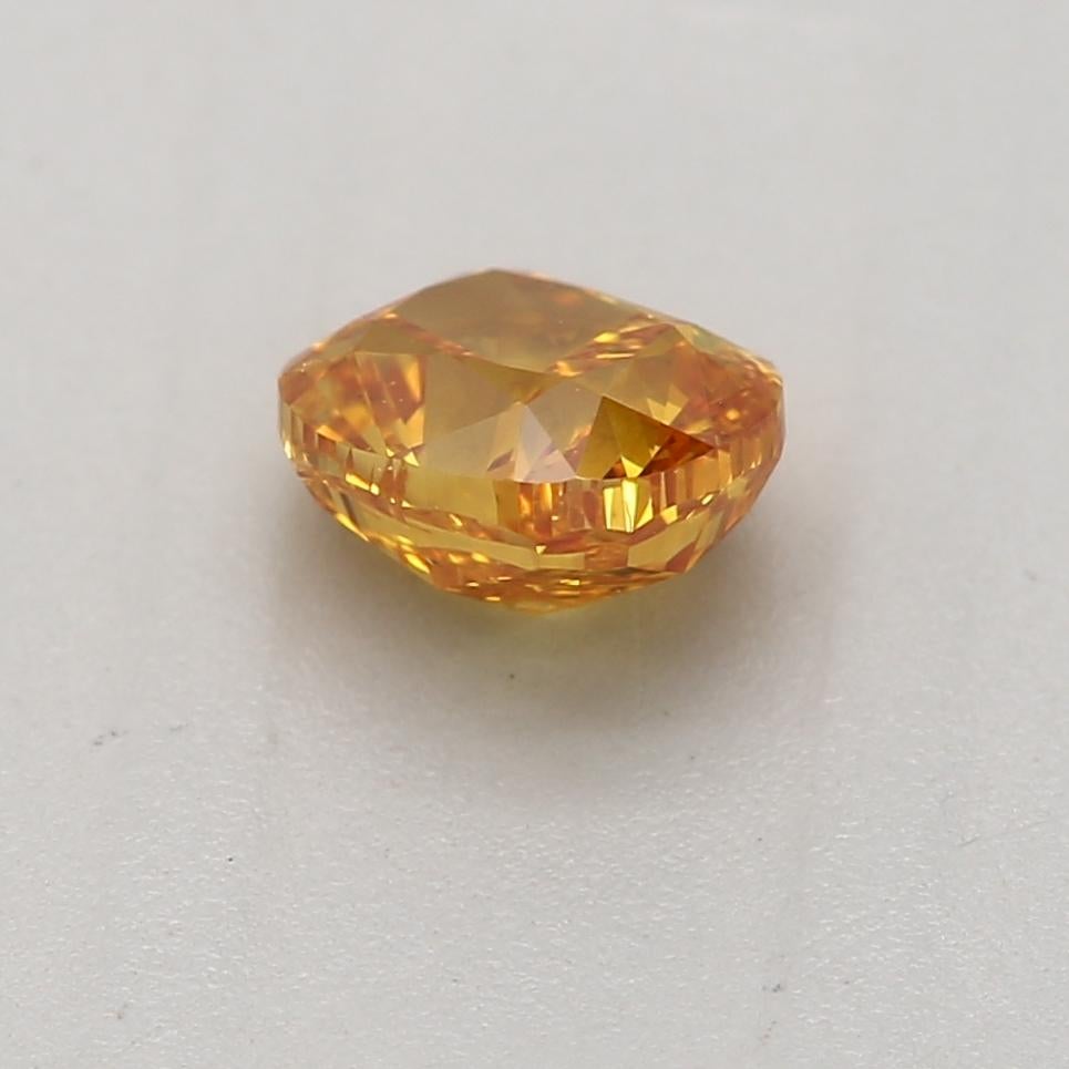 Certificate: GIA
Report Number: 7311653900
Shape And Cut: Cushion
Carat Weight: 0.45 carat
Measurements:  4.57 X 3.94 X 2.90 mm
Color Grade: Fancy Vivid Yellow Orange

FEATURES OF THE DIAMOND:

This Fancy vivid yellow-orange diamonds are a