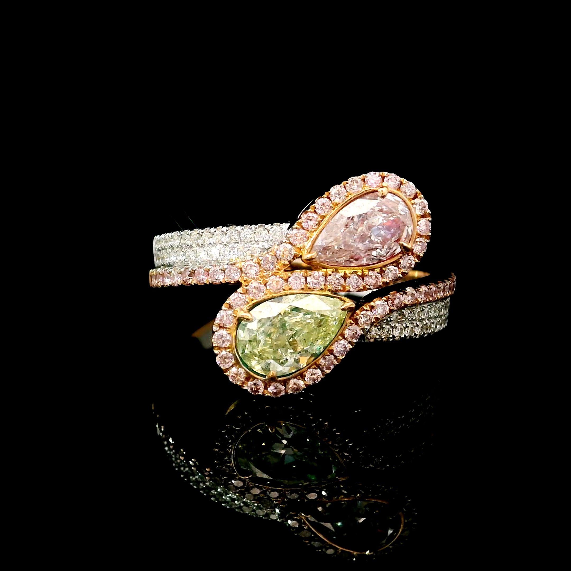 18kt white gold ring with diamonds
  
  Gold colour & karat: White gold 18kt
  Weight: 4.88 grams
  
  Set with-
  Stone type: Diamonds
  Shape: Pear
  Carat: 1.00 / 0.42
  Colour: Faint Pink  
  Clarity: SI1 / SI2
  
  Surrounding Stones: Diamonds
