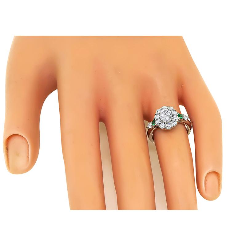 This is an elegant platinum engagement ring. The ring is centered with a sparkling GIA certified oval cut that weighs 0.54ct. The color of the diamond is D with VS2 clarity. The center diamond is accentuated by dazzling round cut diamonds that weigh
