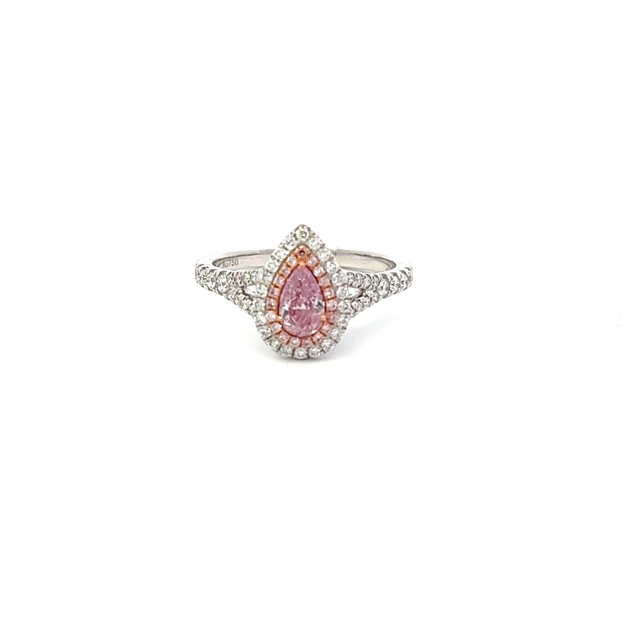 Center: 0.54ct Light Pink Pear I3 GIA #5276002179
Setting: 18k White Gold 0.40ctw White and Pink Diamonds

An extremely rare and stunning natural pink diamond center. Pink Diamonds account for less than 0.01% of all diamonds mined in the world! With