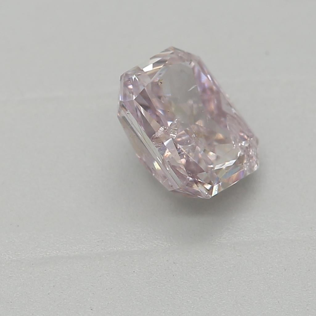 Women's or Men's GIA Certified 0.55 Carat Fancy Pink I2 Clarity Diamond For Sale