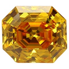 GIA Certified 0.55 Carat Fancy Vivid Orangy Yellow SI1 Clarity Diamond