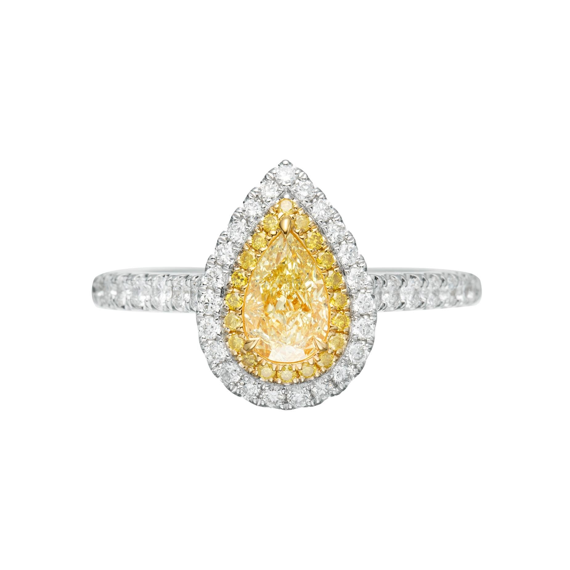 Elevate your jewelry collection with a piece of rare and captivating beauty. This 0.55ct Natural Fancy Light Yellow pear-shaped diamond solitaire ring in 18kt gold is a true treasure, designed to leave a lasting impression.

The star of this ring is