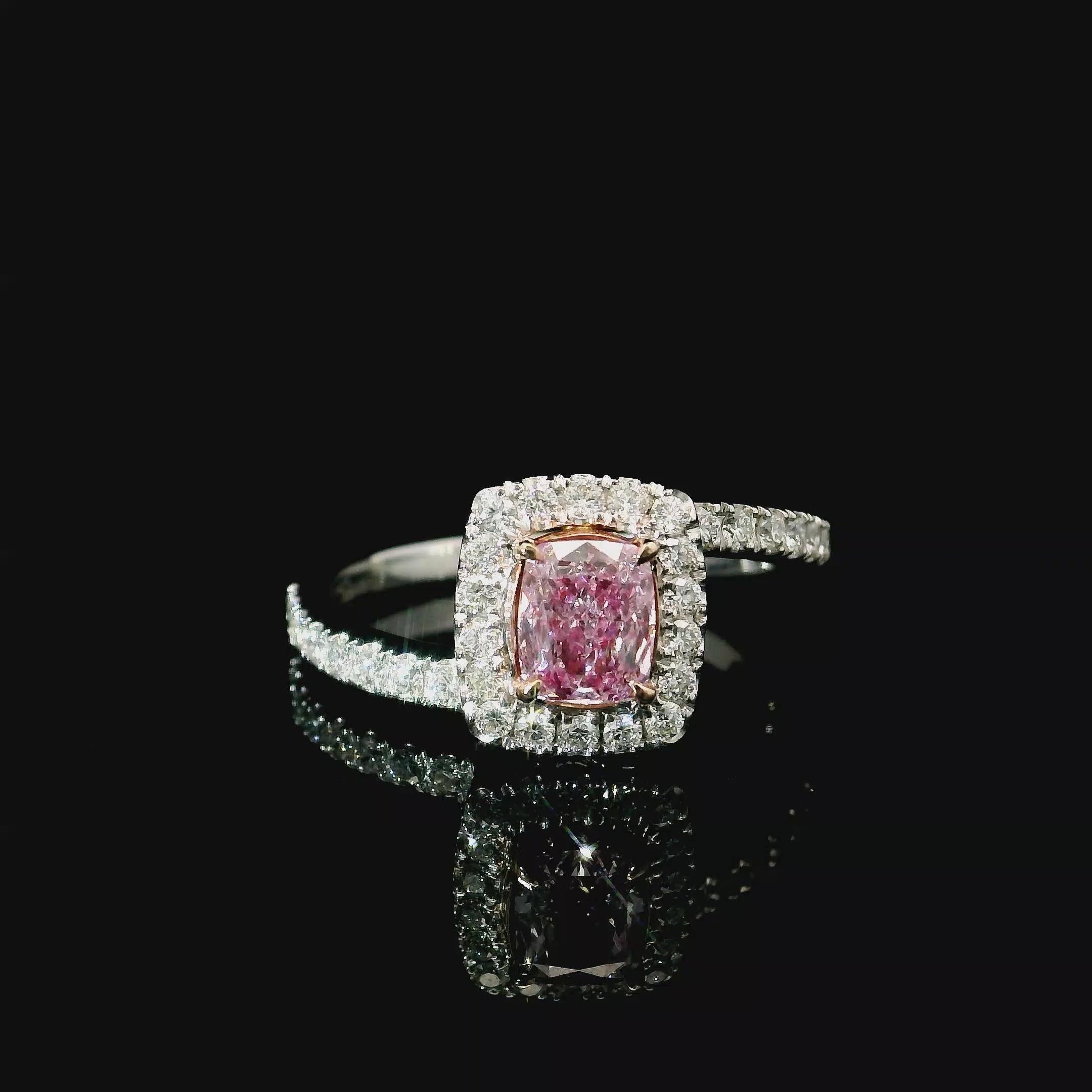 18kt white gold ring with diamonds
  
  Gold colour & karat: White gold 18kt
  Weight: 3.186 grams
  
  Set with-
  Stone type: Diamonds
  Shape: Cushion
  Carat: 0.56 ct
  Colour: Light Pink
  Clarity: VS1
  
  Surrounding Stones: Diamonds

 1)