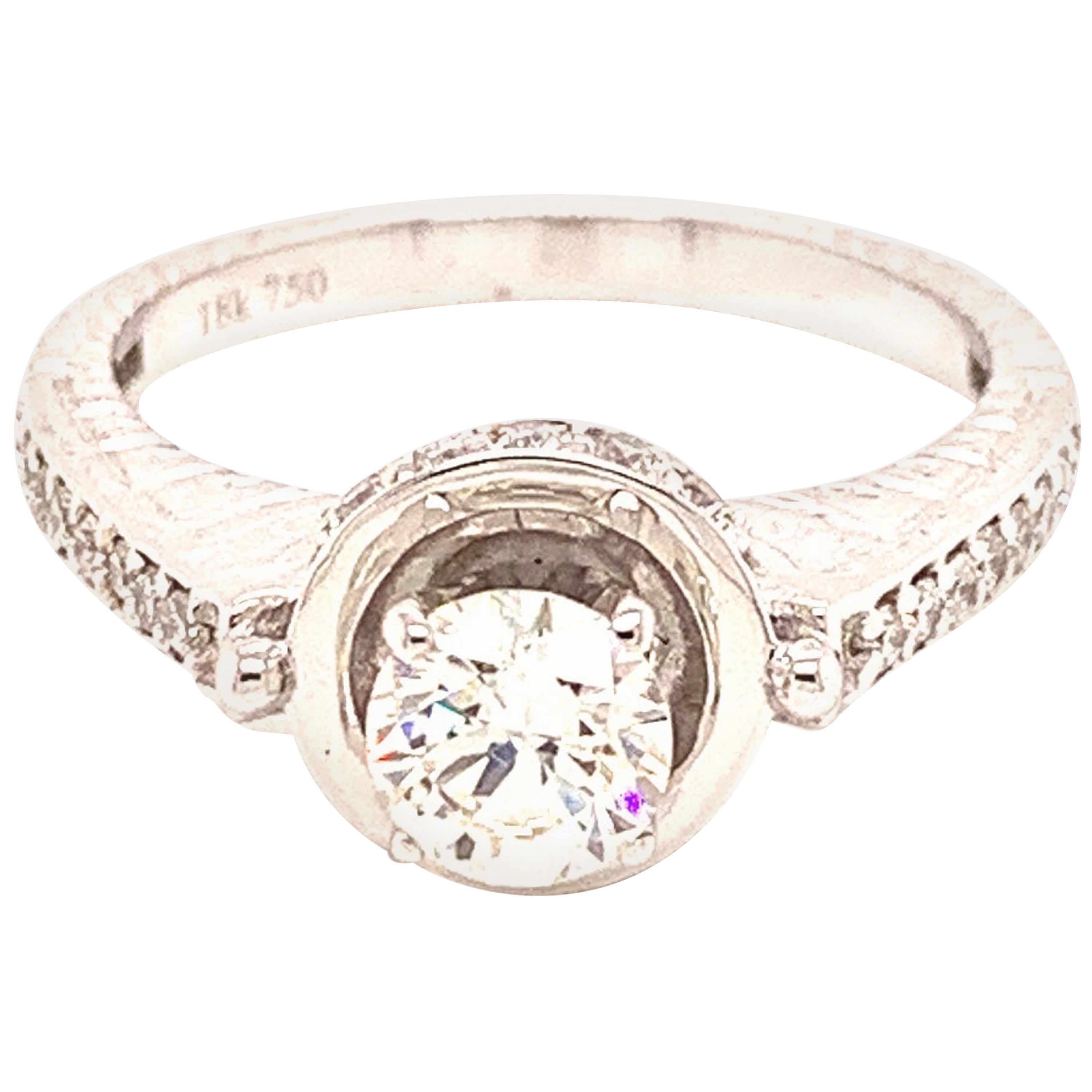 Bague de fiançailles en or avec diamant blanc taille brillant rond de 0,56 carat certifié GIA en vente