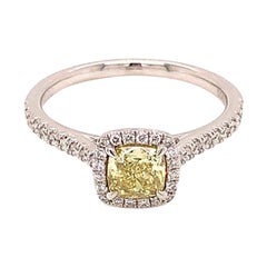 Bague en platine avec diamant jaune coussin de 0,57 carat certifié par le GIA
