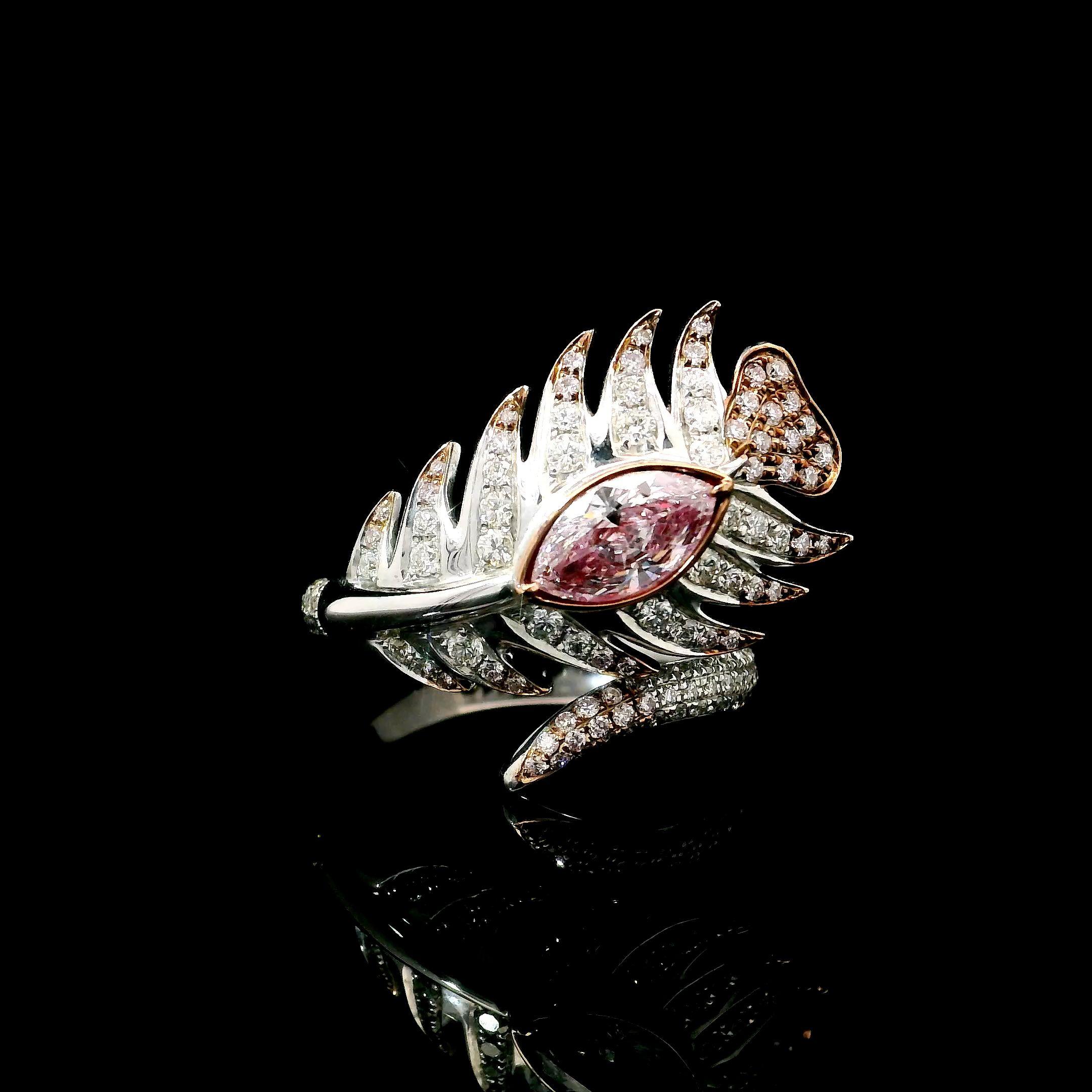 Bague en or blanc 18kt avec diamants
  
  Couleur de l'or et carat : Or blanc 18kt
  Poids : 5,61 grammes
  
  Ensemble avec...
  Type de pierre : Diamants
  Forme : Marquise
  Carat : 0.57
  Couleur : Brun rosé léger
  Clarté : I1
  
  Pierres