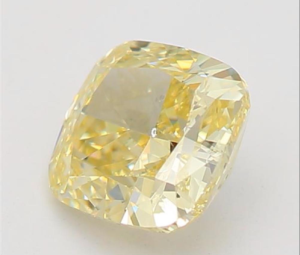 Cushion Cut GIA Certified 0.57 Carat Fancy Light Brownish Yellow SI2 Clarity Diamond For Sale