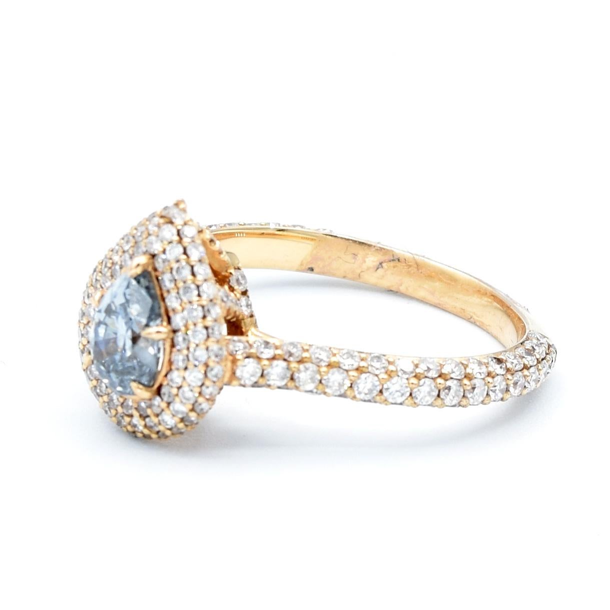 This remarkable natural 0.58 Carat Pear shape Fancy grayish blue is certified from GIA (report #1162731992).

Set in 18 karat rose gold and surrounded in pavé diamonds.

Ring Size 6 (resizeable)
3.70 grams 

Every Upper-Luxury piece will arrive in