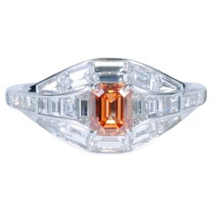 GIA Certified, 0.58ct Natural Fancy Vivid Yellow-Orange Emerald Cut Ring 18KT