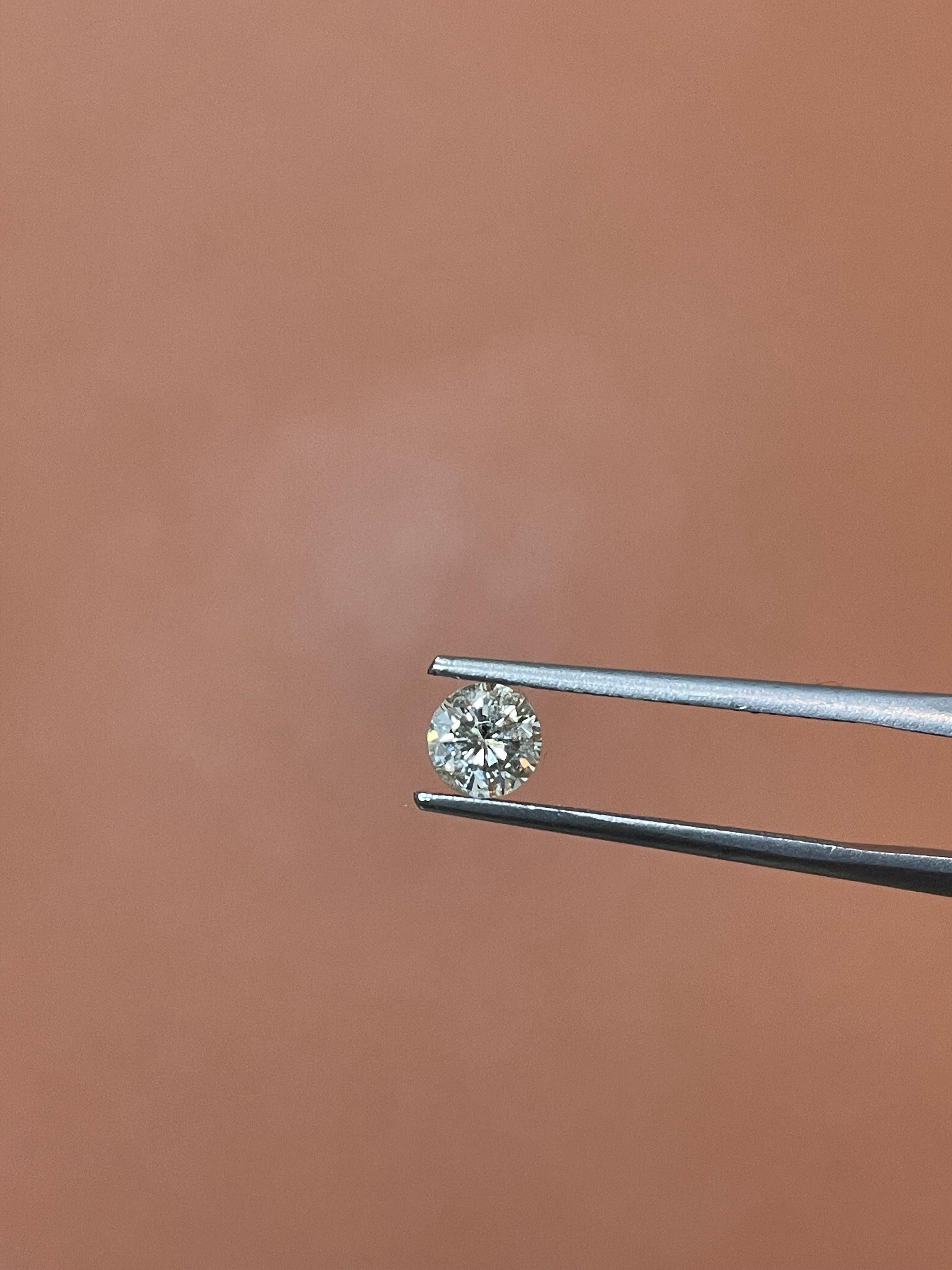 Taille brillant Diamant brut rond certifié GIA 0.58CT S-T I2 en vente