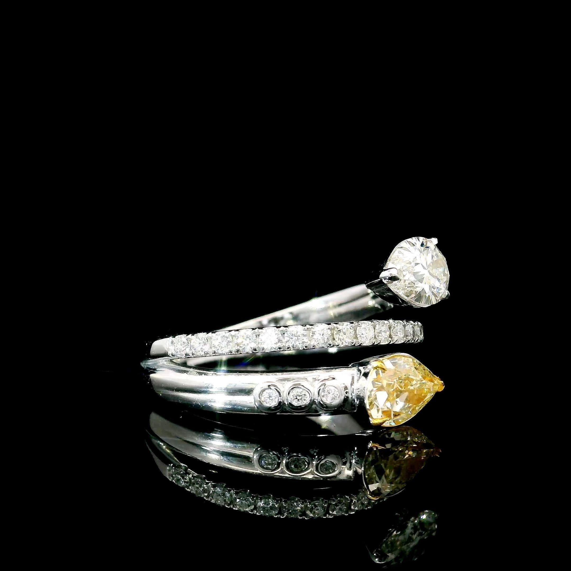 Pear Cut GIA Certified 0.59/0.56 Cts Fancy Light Yellow / G VVS1/VS1 Clarity Diamond Ring For Sale