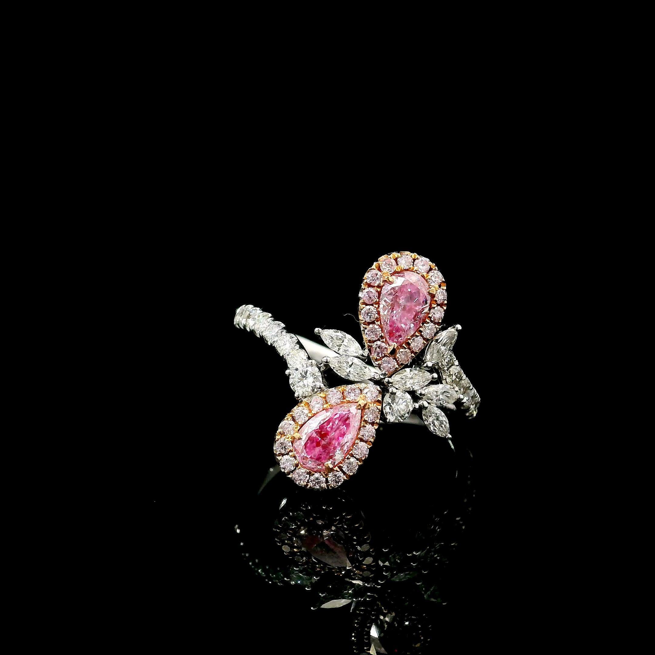 Bague en or blanc 18kt avec diamants
  
  Couleur de l'or et carat : Or blanc 18kt
  Poids : 3.16 grammes
  
  Ensemble avec...
  Type de pierre : Diamants
  Forme : Poire
  Carat : 0,29 / 0,30
  Couleur : Rose pâle  
  Clarté : SI2 / I2
  
 