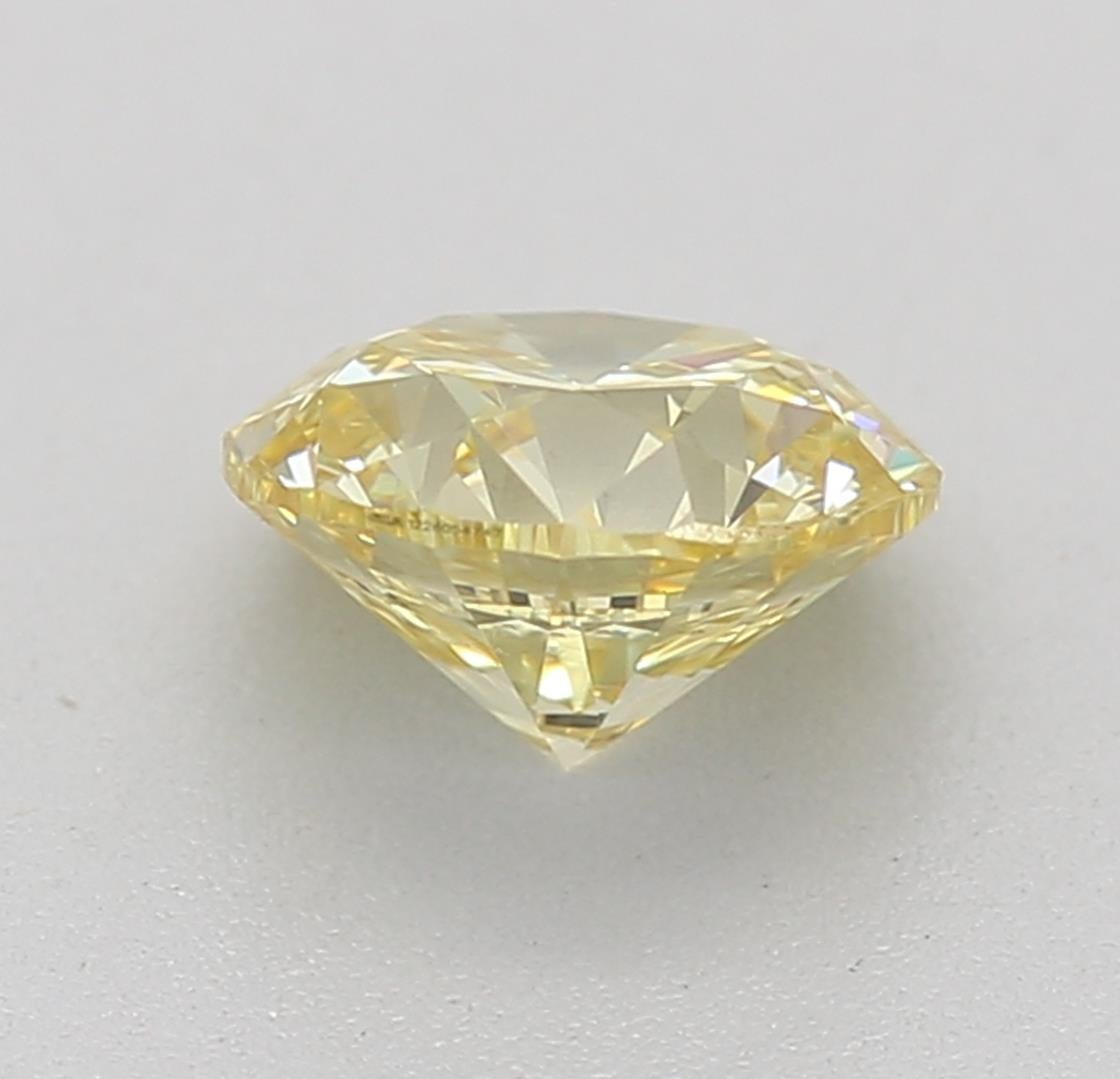 GIA Certified 0.60 Carat Fancy Yellow SI1 Clarity Diamond In New Condition For Sale In บางรัก, TH