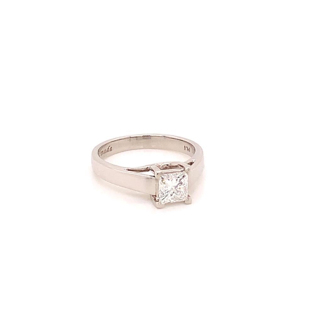 This immaculate ring features a Square Modified Brilliant Diamond at its centre, held in a claw setting on a Platinum band. The Diamond weighs 0.6 carats and is of E colour and VVS2 clarity. This excellent colour and clarity mean the Diamond is