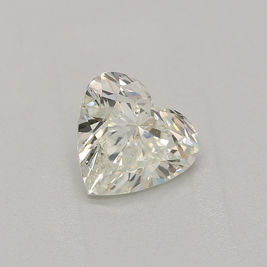 Certificate: GIA
Report Number: 2436654306
Shape And Cut: Heart
Carat Weight: 0.60carat
Measurements:  5.29 x 5.79 x 3.32 mm
Color Grade: Very Light Green Yellow

Our heart-shaped diamond is a unique and romantic variation of the traditional diamond