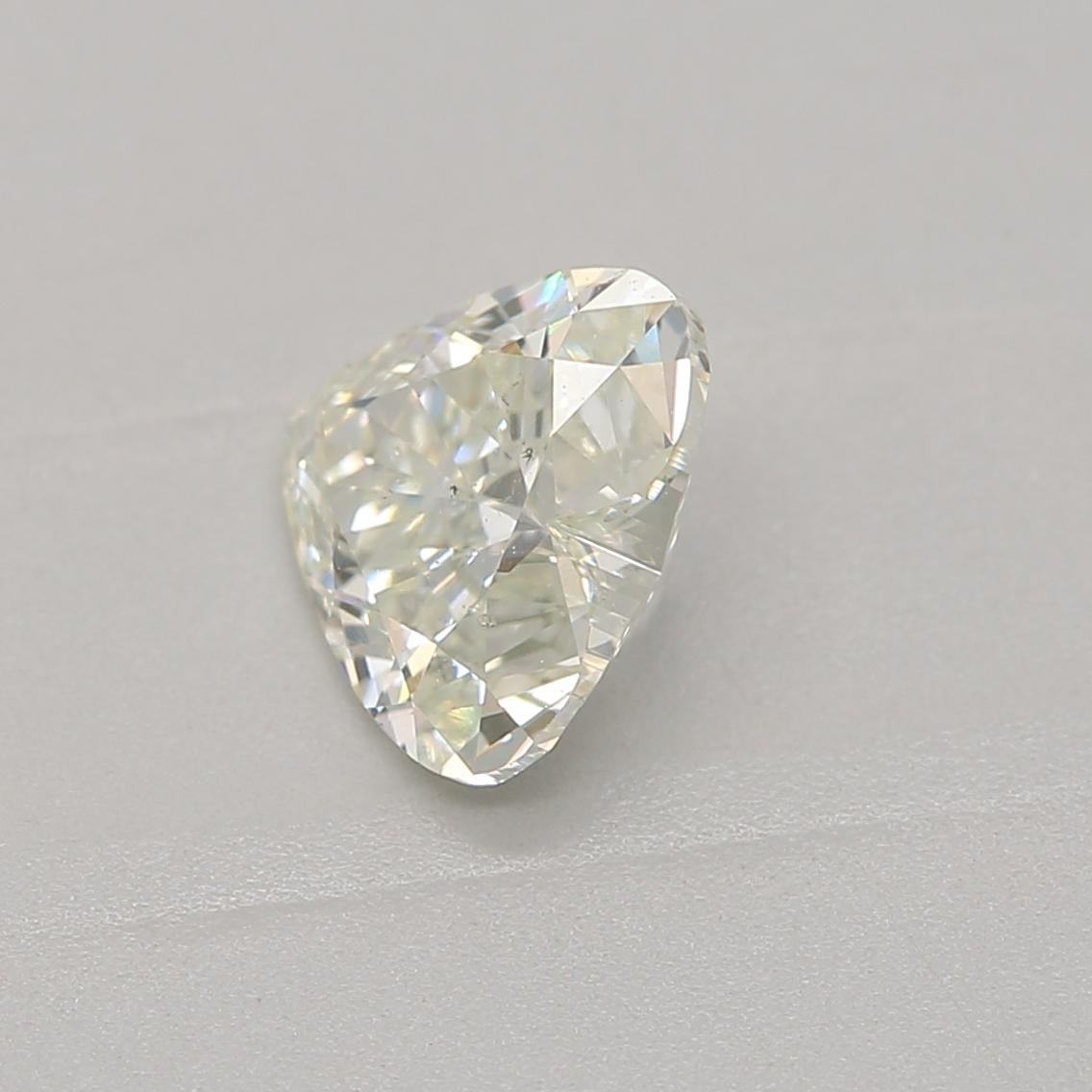 Heart Cut GIA Certified 0.60 Carat Very Light Green Yellow SI1 Clarity Diamond For Sale