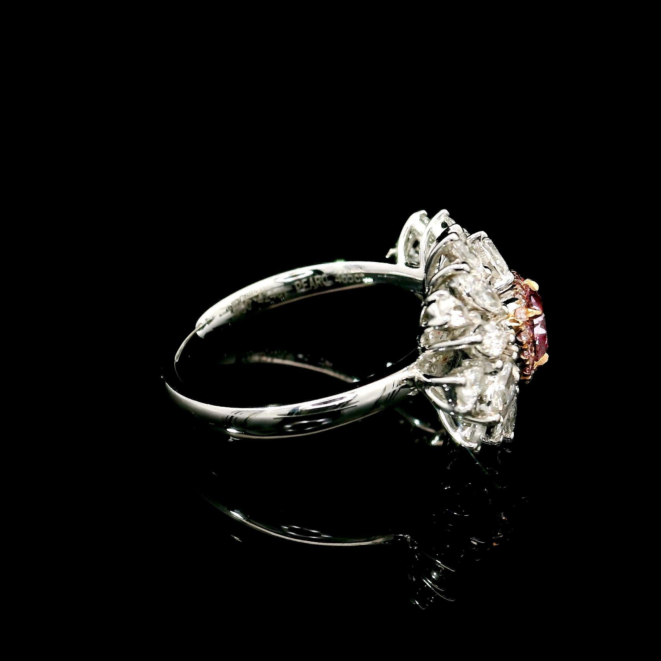 18kt white gold ring with diamonds
  
  Gold colour & karat: White gold 18kt
  Weight: 5.42 grams
  
  Set with-
  Stone type: Diamonds
  Shape: Radiant
  Carat: 0.60
  Colour: Very LIght Pink  
  Clarity: SI1
  
  Surrounding Stones: Diamonds
 1)