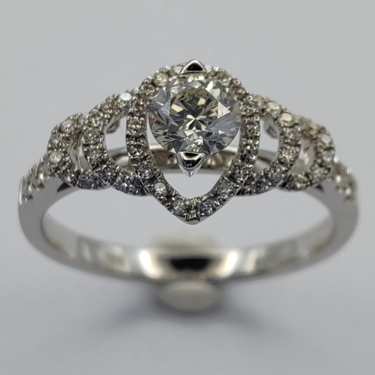 Contemporary GIA Certified .61 Carat Round Cut Diamond Bridal Cluster 18K White Gold Ring For Sale
