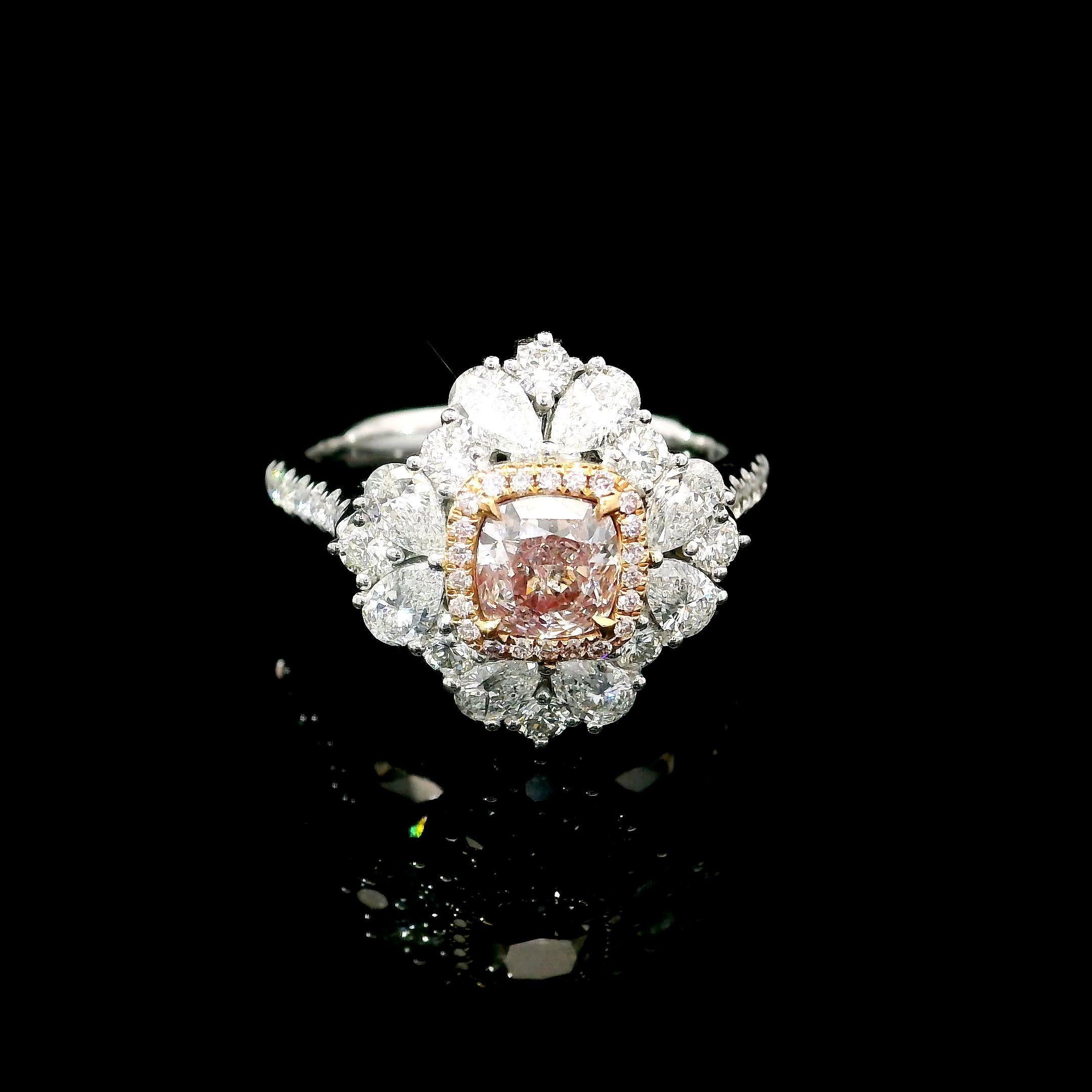 18kt white gold ring with convertable 
  
  Gold colour & karat: White gold 18kt
  Weight: 6.15 grams
  
  Set with-
  Stone type: Diamonds
  Shape: Cushion
  Carat: 0.61 ct
  Colour: Very Light Pink
  Clarity: I1
  
  Surrounding Stones: Diamonds
