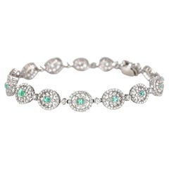 GIA Certified 0.62 Carat Brazilian Paraiba and Diamond Bracelet Made in Platinum