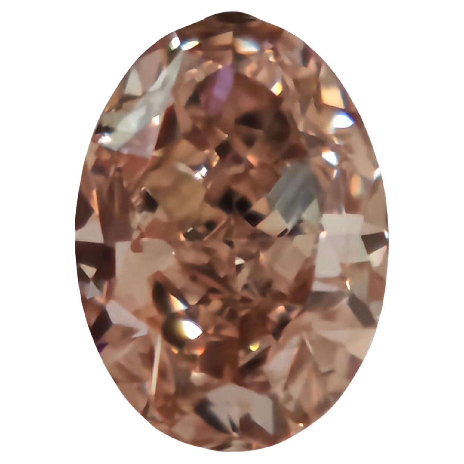 GIA Certified 0.62 Carat Fancy Brownish Orangy Pink Oval natural Diamond en venta