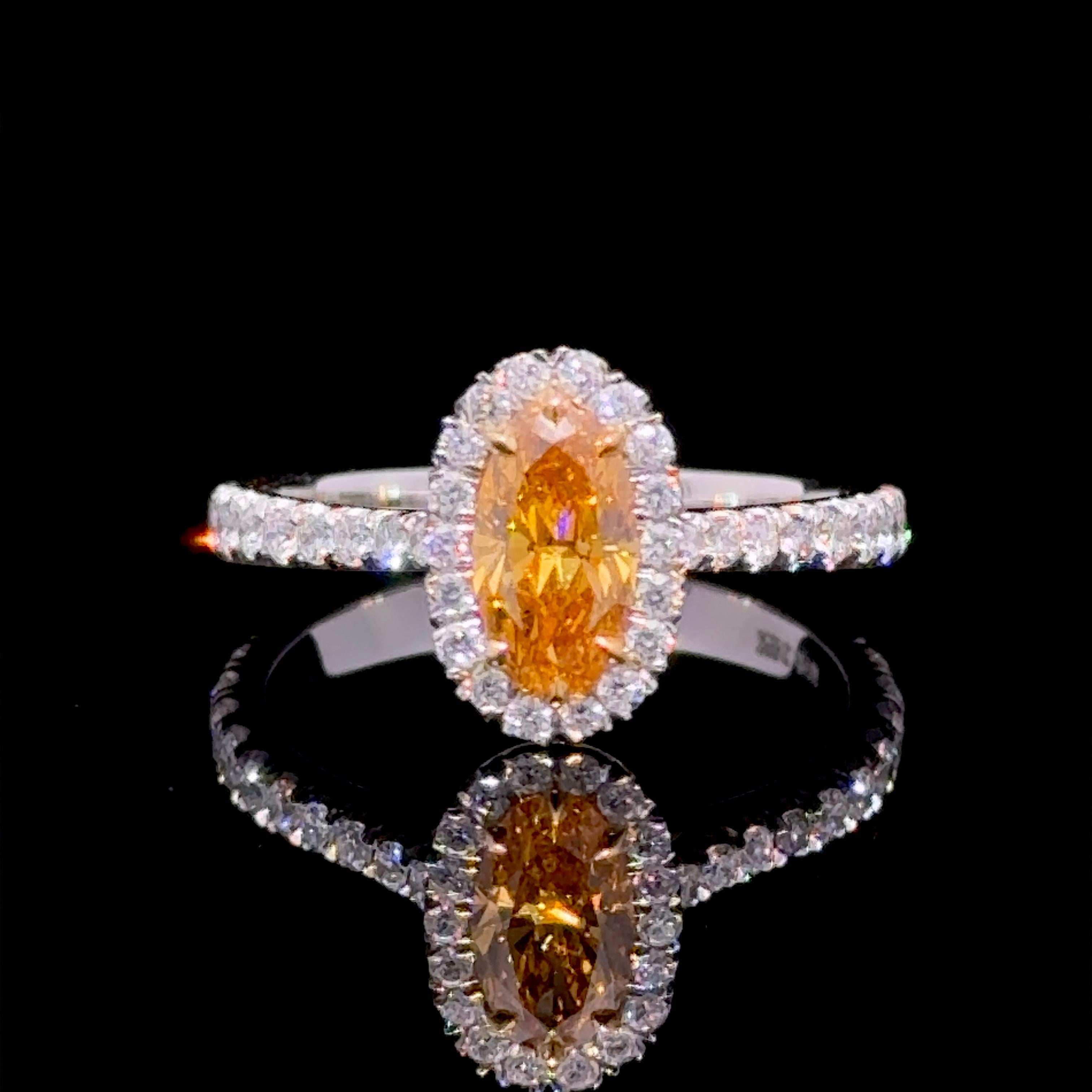 Women's GIA Certified 0.62 Carat Natural Vivid Orange Diamond Halo Ring For Sale