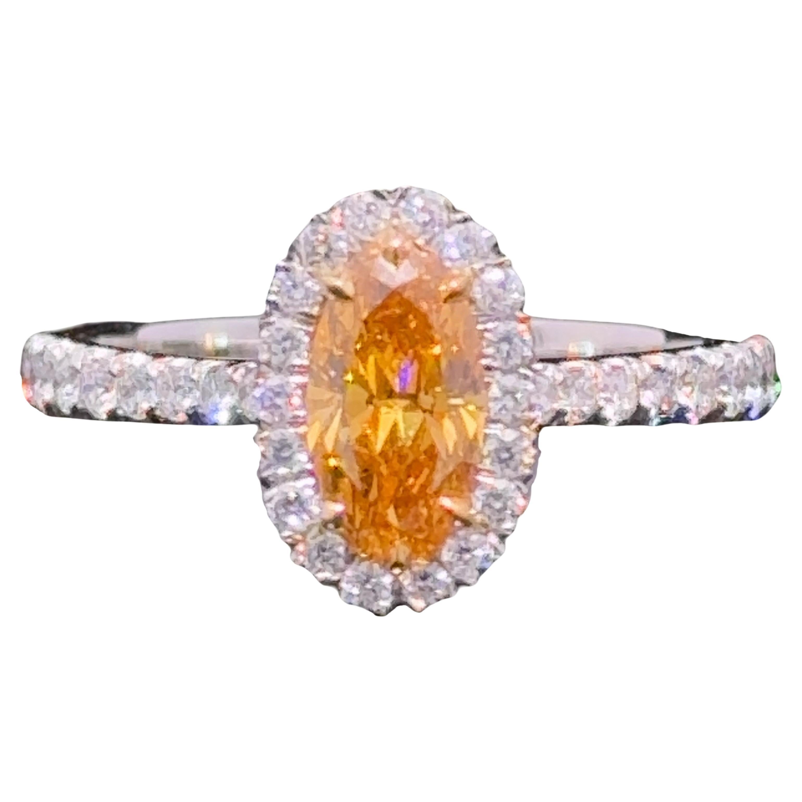 GIA Certified 0.62 Carat Natural Vivid Orange Diamond Halo Ring For Sale