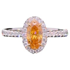 GIA Certified 0.62 Carat Natural Vivid Orange Diamond Halo Ring