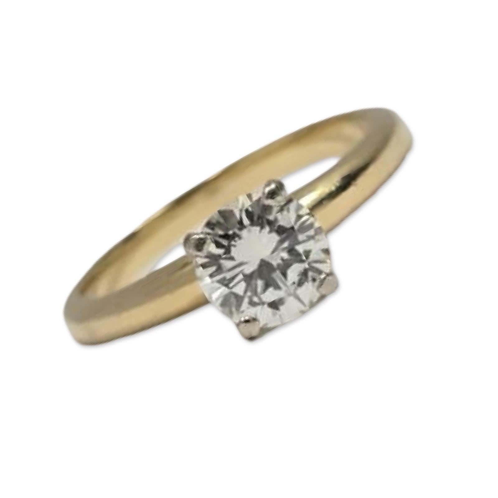 Bague solitaire en or 18 carats avec diamant certifié GIA de 0,62 ct (J/SI1) en vente 1