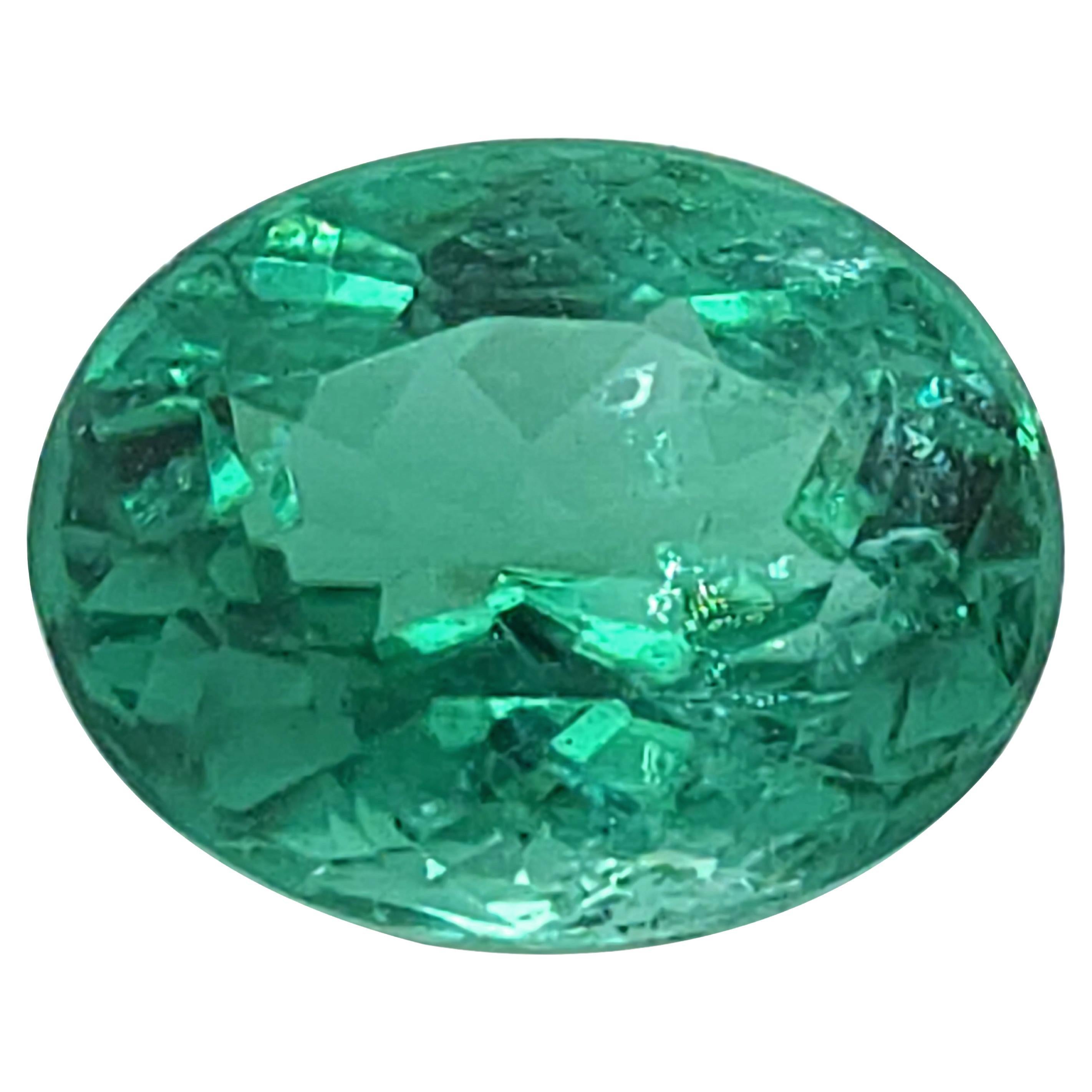 GIA Certified 0.63 ct Mozambique Loose Paraiba Tourmaline, Blue-Green Tourmaline For Sale