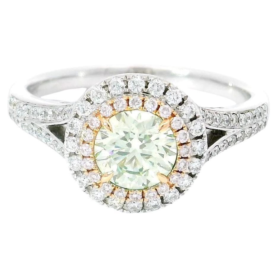 GIA Certified 0.64 Carat Fancy Light Yellow Green VS2 Clarity Diamond Ring
