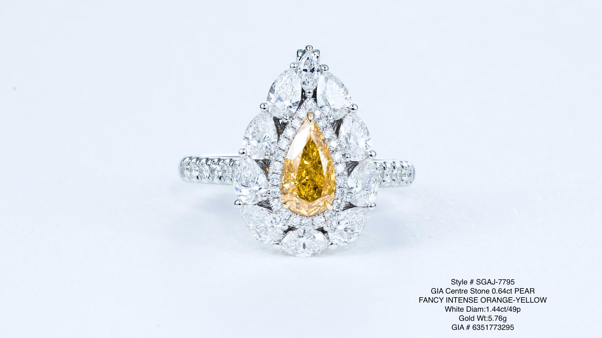 Presenting an extraordinary piece of jewelry featuring a remarkable 0.64ct natural fancy intense orange-yellow diamond, elegantly set on an 18kt gold ring. This exquisite diamond ring is not only a stunning accessory for your finger but can also be