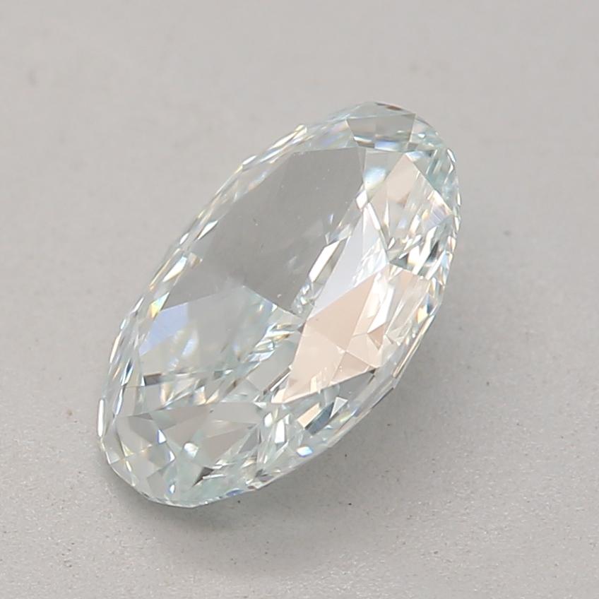 Oval Cut GIA Certified 0.65 Carat Light Blue SI1 Clarity Diamond For Sale