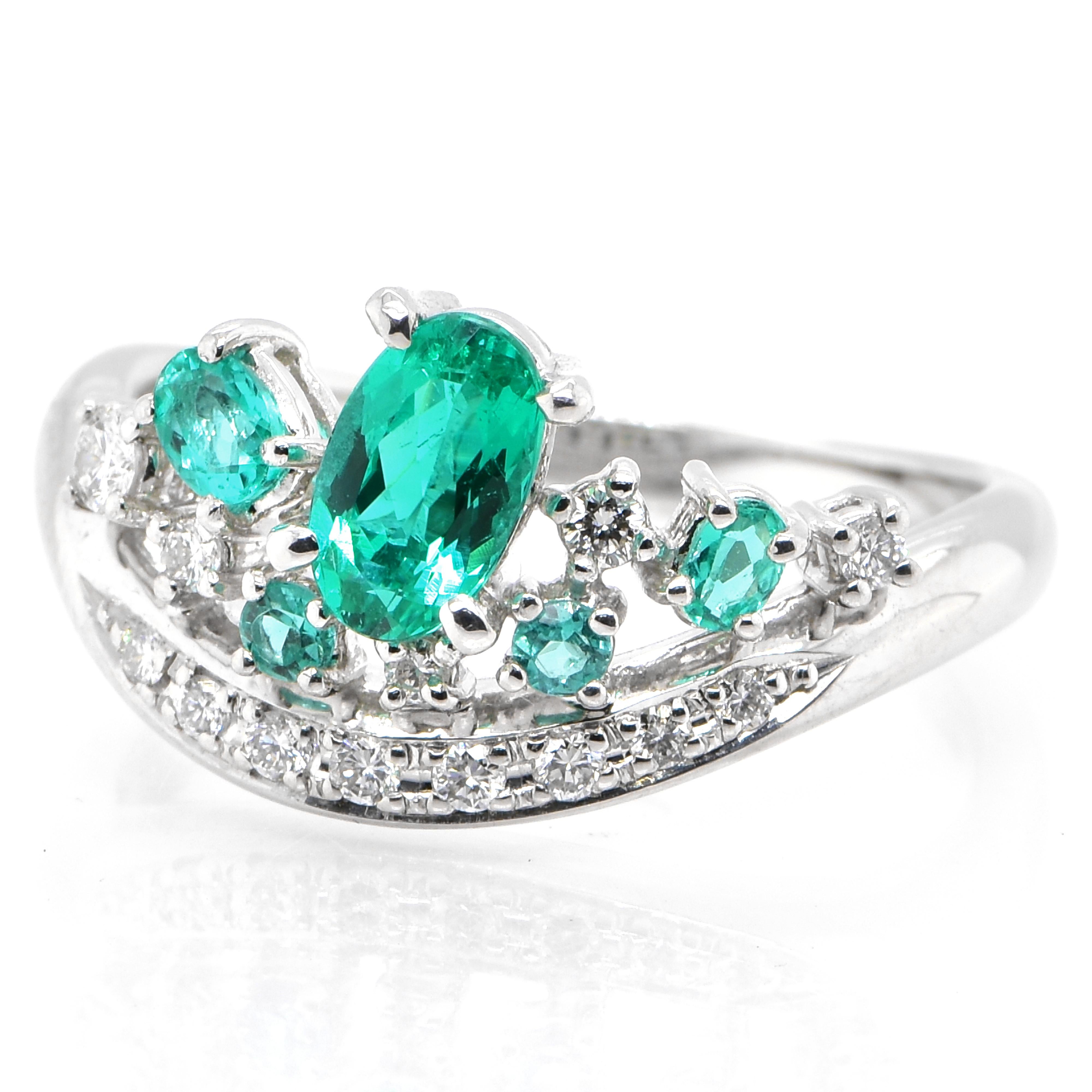 A beautiful ring featuring a GIA Certified 0.65 Carat Natural Brazilian Paraiba Tourmaline and 0.19 Carats of Diamond Accents set in Platinum. Paraiba Tourmalines were only discovered 30 years ago in the Brazilian state of the same name- Paraiba.