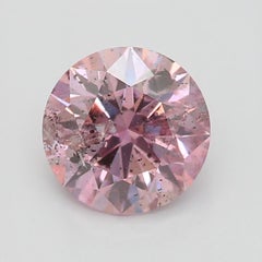 GIA Certified 0.66 Carat Fancy Purplish Pink I2 Clarity Diamond