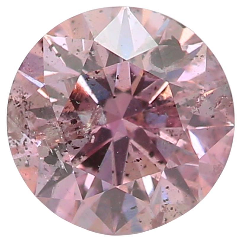 Diamant rose violacé fantaisie de 0,66 carat de pureté I2 certifié GIA