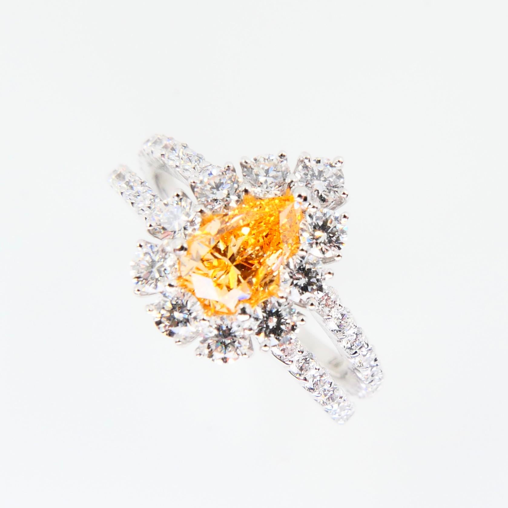 Contemporary GIA Certified 0.66 Fancy Intense Yellowish Orange Pear Diamond Cocktail Ring