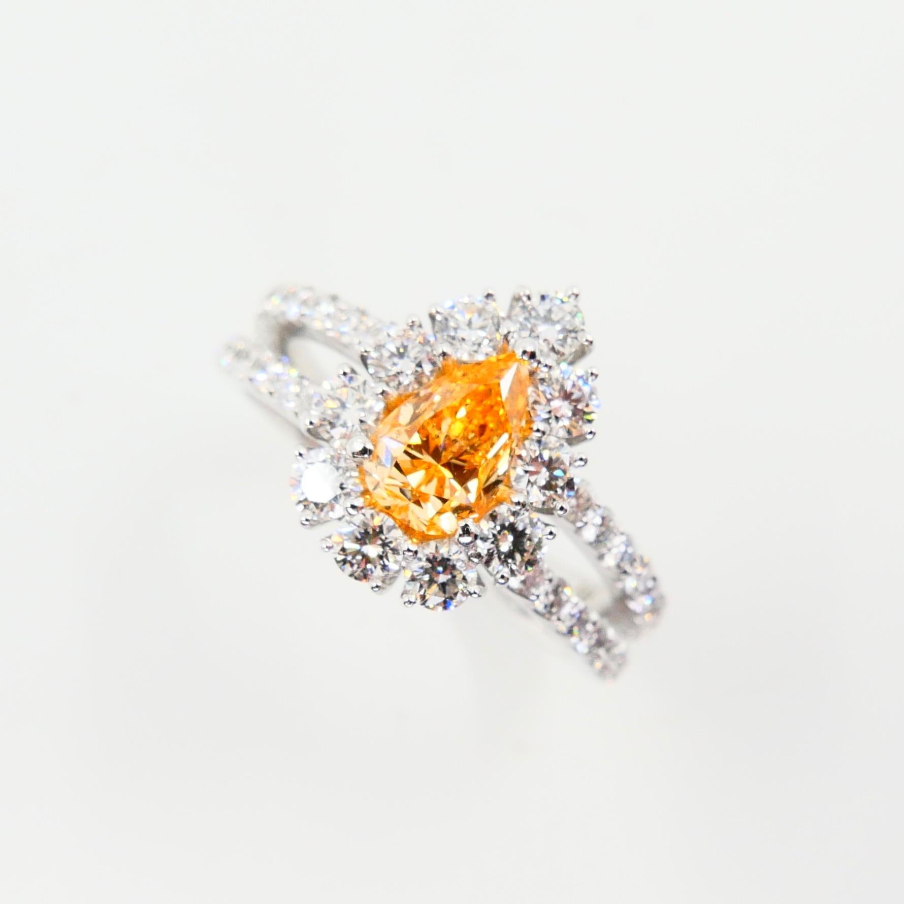 Women's GIA Certified 0.66 Fancy Intense Yellowish Orange Pear Diamond Cocktail Ring