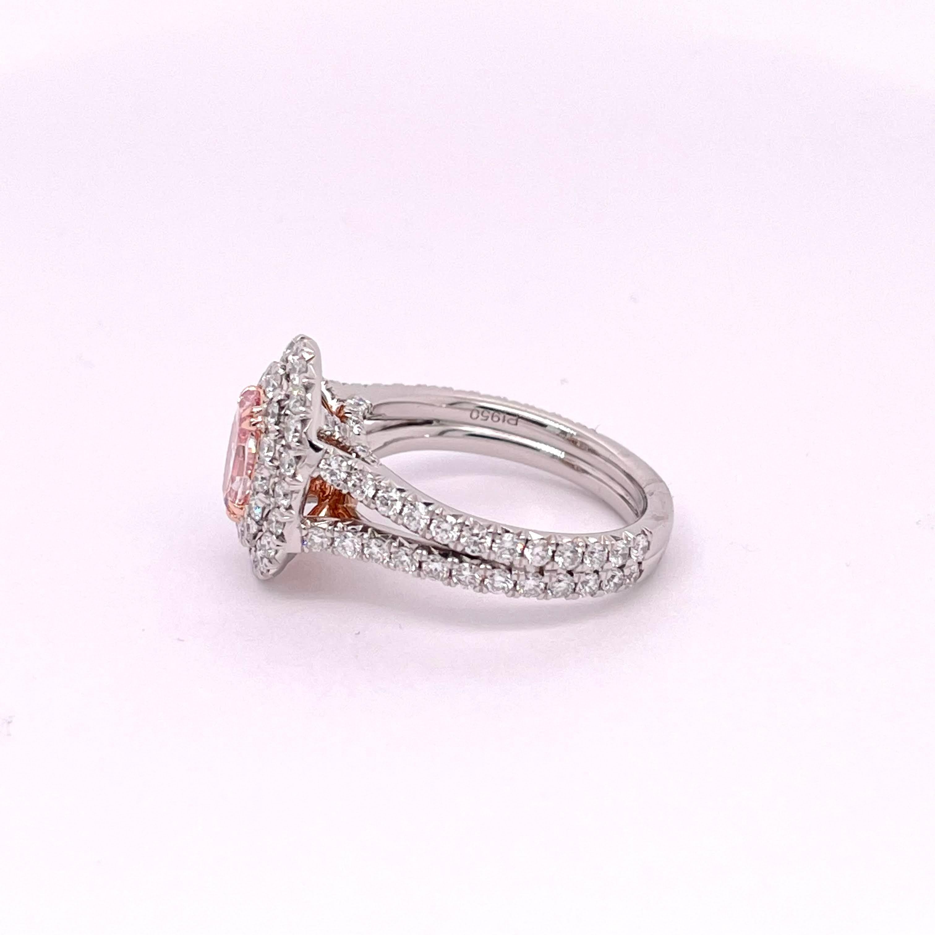 Oval Cut GIA Certified 0.67 Carat Fancy Intense Pink Diamond Ring For Sale