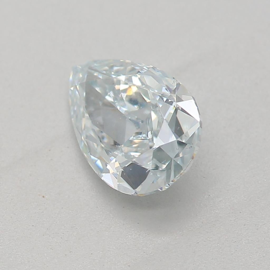 Pear Cut GIA Certified 0.67 Carat Very Light Blue SI1 Clarity Diamond For Sale