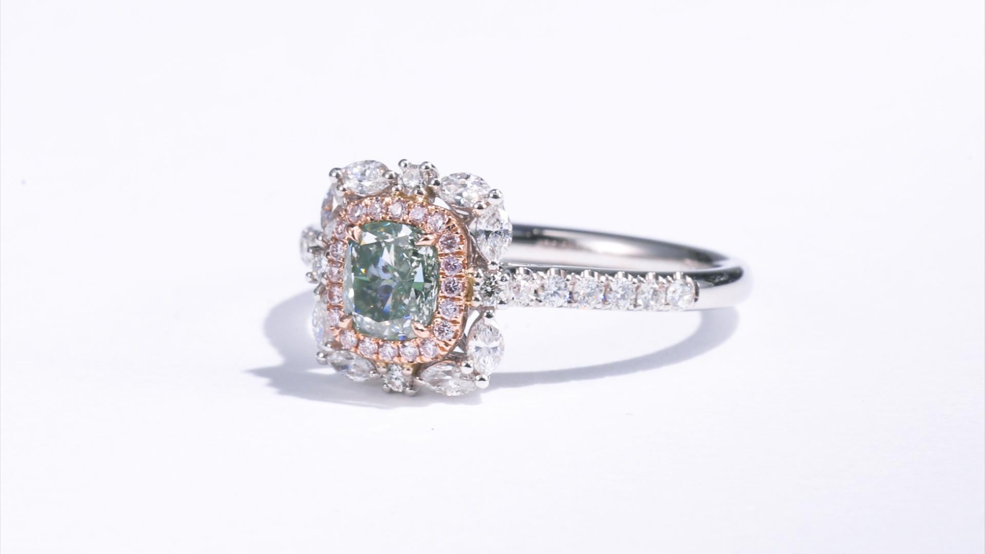 Contemporary GIA Certified, 0.67 Carat Cushion Shape Natural Fancy Green Diamond 18kt Ring For Sale