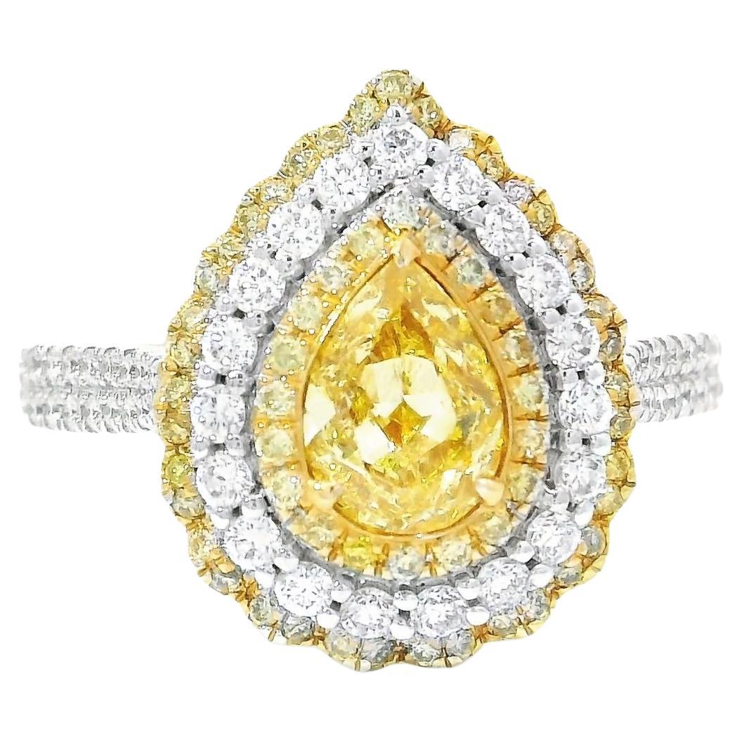 GIA Certified 0.68 Carat Fancy Light Yellow VS2 Clarity Diamond Ring
