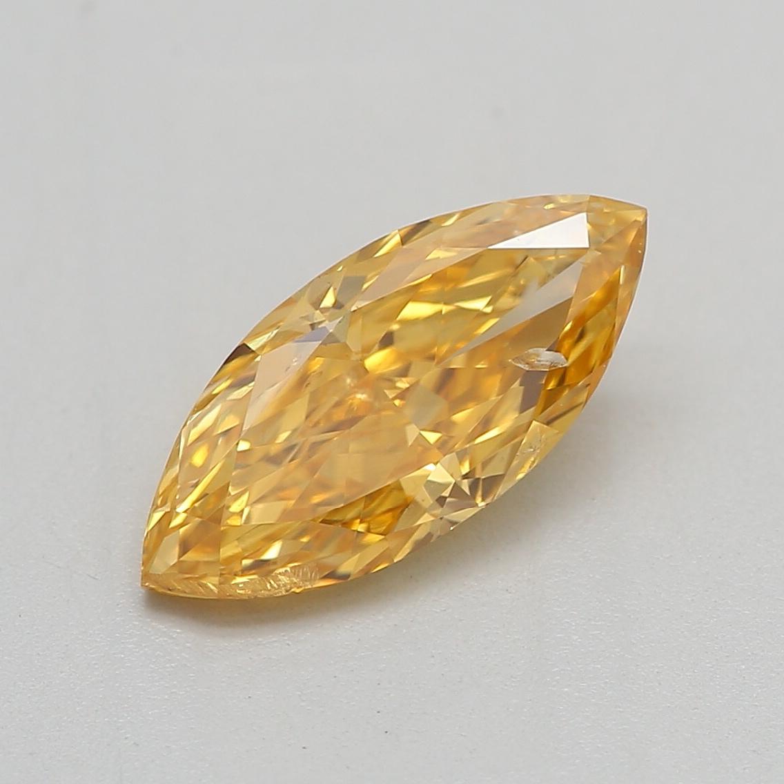 Certificate: GIA 
Report Number: 1485102498
Shape And Cut: Marquise
Carat Weight: 0.69 carat
Measurements: 9.40 x 4.25 x 2.68 mm
Color Grade: Fancy Vivid Orangy Yellow

FEATURES OF THE DIAMOND:

This Fancy Vivid Orangy Yellow diamond is a striking