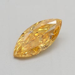 GIA Certified 0.69 Carat Fancy Vivid Orangy Yellow I1 Clarity Diamond