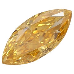 GIA Certified 0.69 Carat Fancy Vivid Orangy Yellow I1 Clarity Diamond
