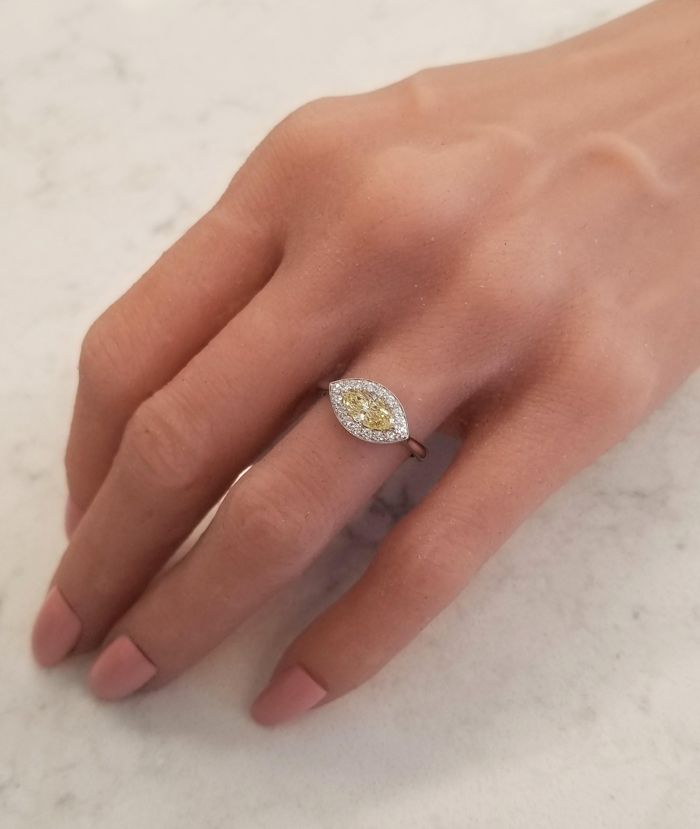 Marquise Cut GIA Certified 0.69 Carat Marquise Fancy Intense Yellow Diamond Cocktail Ring For Sale
