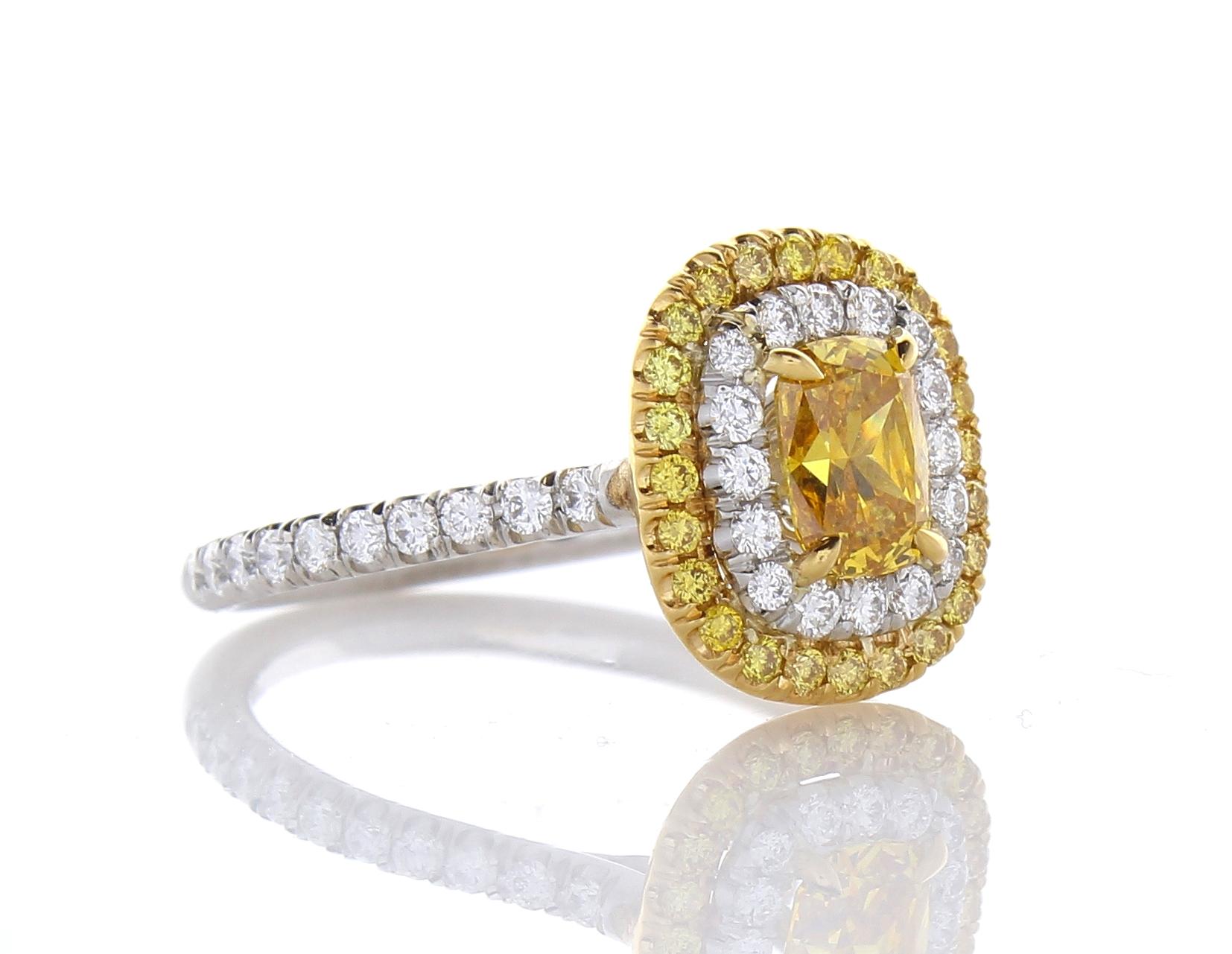 Women's GIA Certified 0.70 Carat Cushion Cut Fancy Vivid Yellow Diamond Cocktail Ring