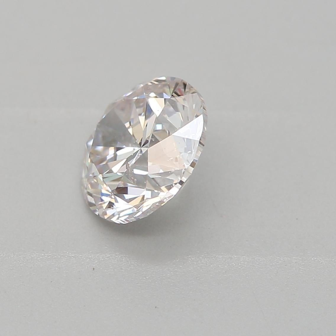 Round Cut GIA Certified 0.70 Carat Faint Pink SI2 Clarity Diamond For Sale